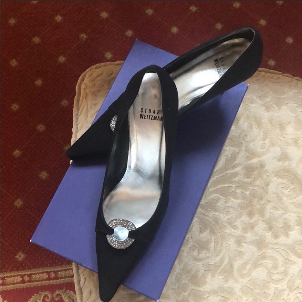 Stuart Weizmann black silk dress pumps.